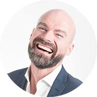 Man smiling about groove crm round