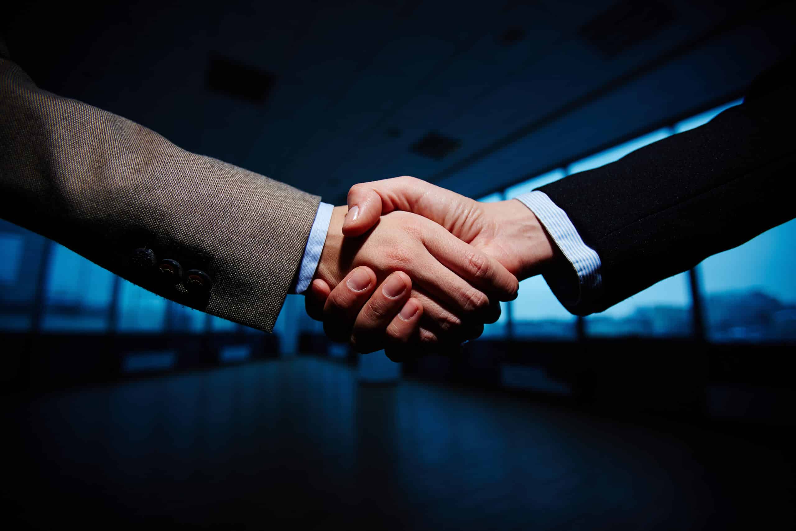 Graphicstock handshake of business partners sbglwuzoxz scaled
