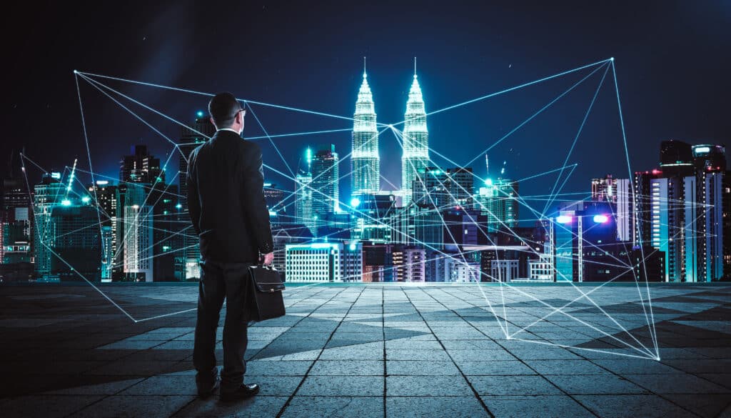 Graphicstock rear view of a businessman looking at large city center with network connection graph concept of success and sociality hu9enl3vxil
