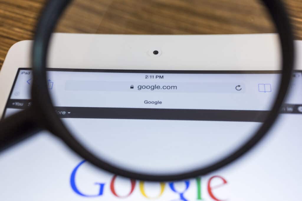 Chiang mai thailand september 17 2014 magnifying glass of google search page view on web browser apple ipad air device hvapi1d3ge