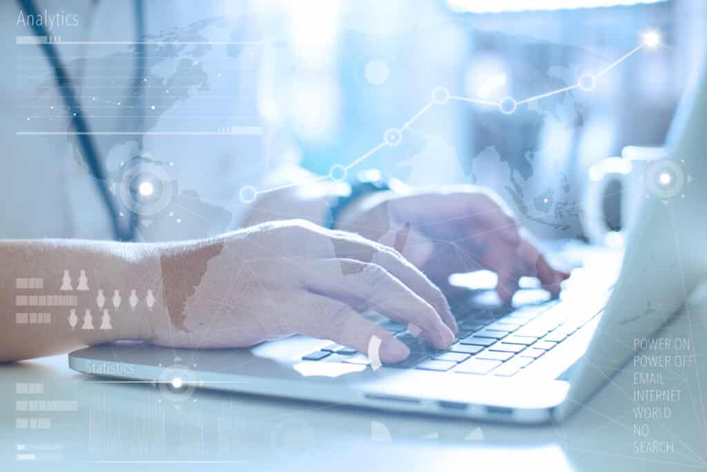 Graphicstock business concept businessman working laptop worldwide connection technology interface global strategy virtual iconinnovation graphs interface rdqlindgsg