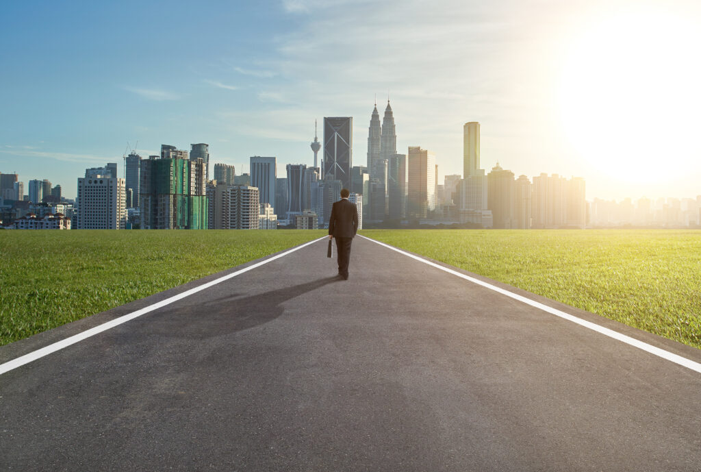Graphicstock image of male entrepreneur walking on the road while carrying suitcase sorxtovxse