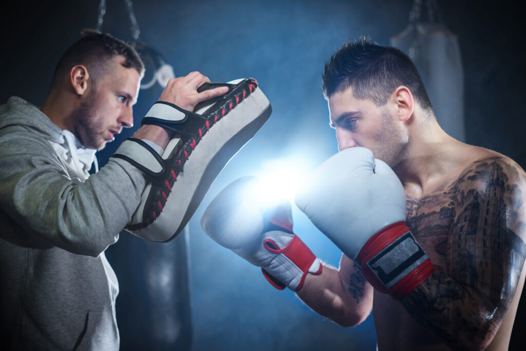 Storyblocks male boxer sparring with personal trainer rdusi1fcm